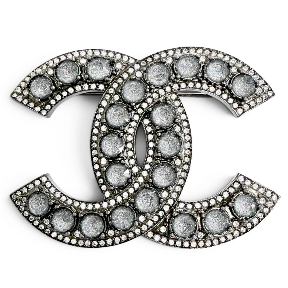 CHANEL Silver Logo Brooch